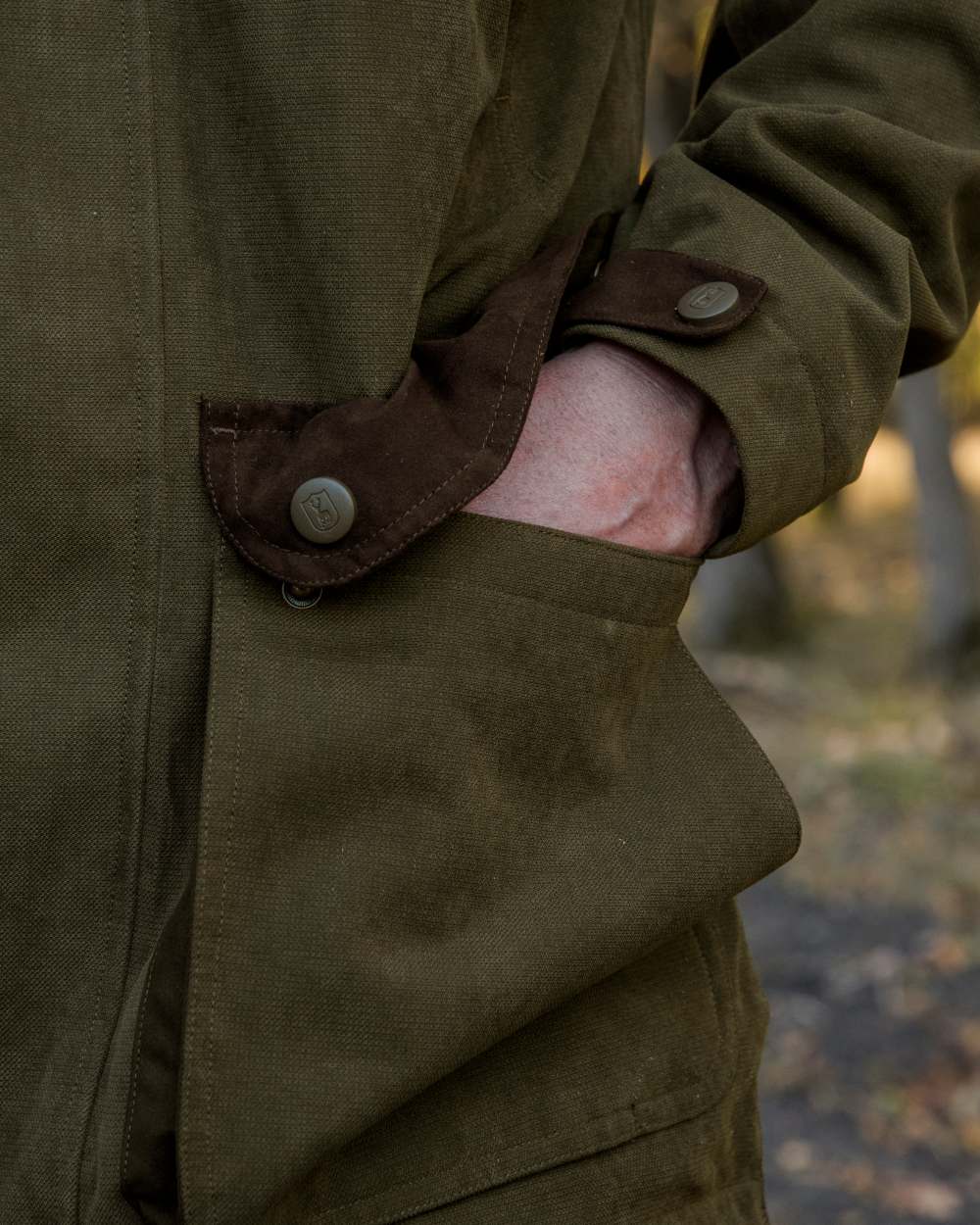 Tarmac Green Coloured Deerhunter Eagle Jacket On A Forest Background 