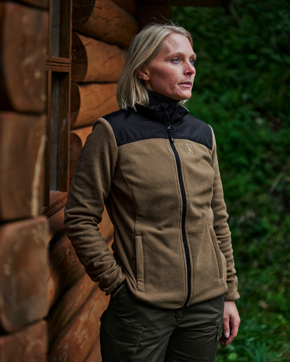 Hickory Coloured Deerhunter Lady Northward Fleece Jacket On A Forest Background 