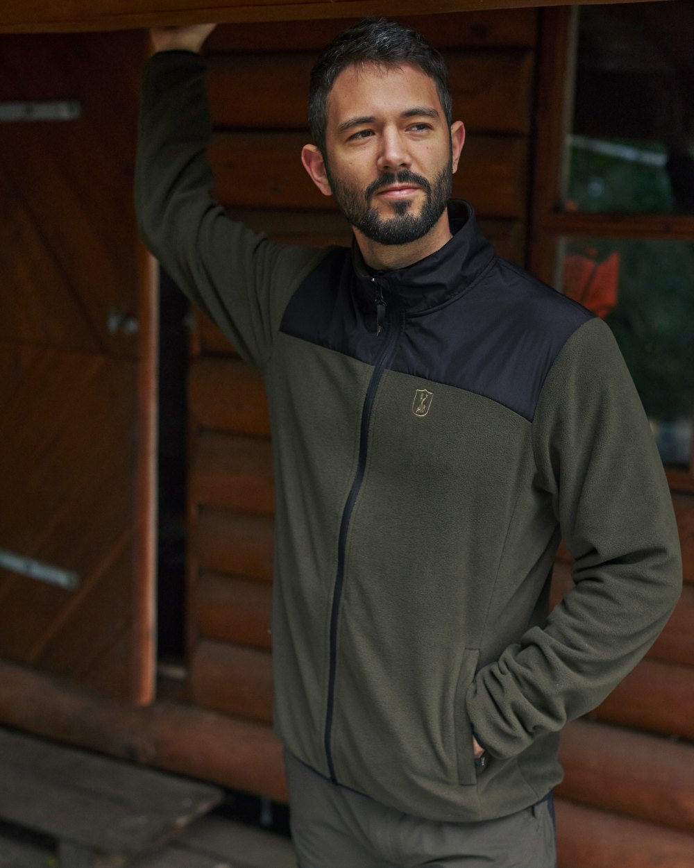 Rifle Green coloured Deerhunter Northward Fleece Jacket on Forest background 