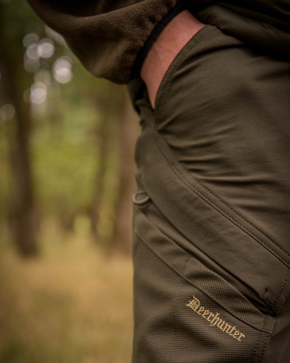 Bark Green coloured Deerhunter Northward Trousers on Outdoor Background 