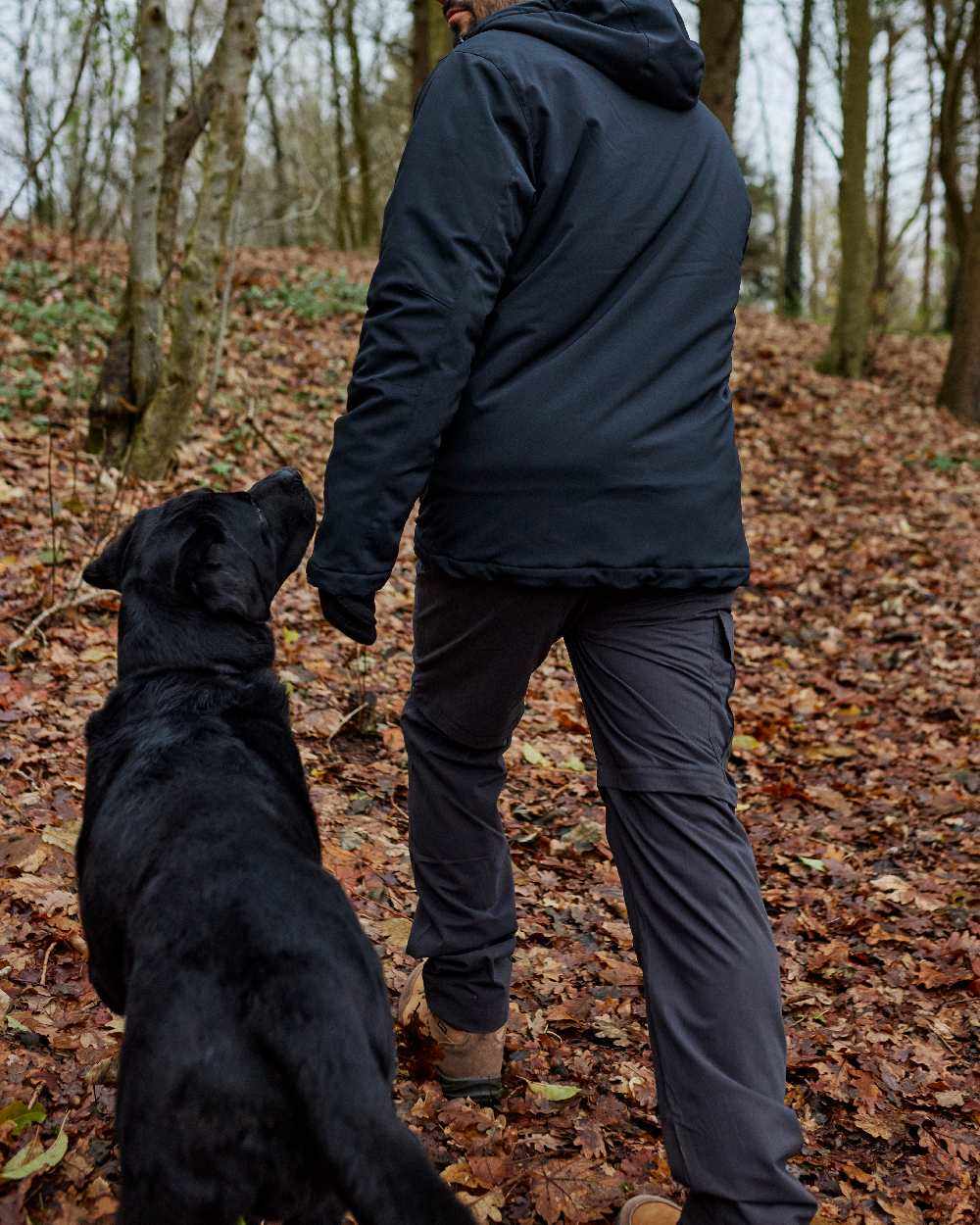 Black Ink coloured Deerhunter Slogen Zip-off Trousers on Forest background 