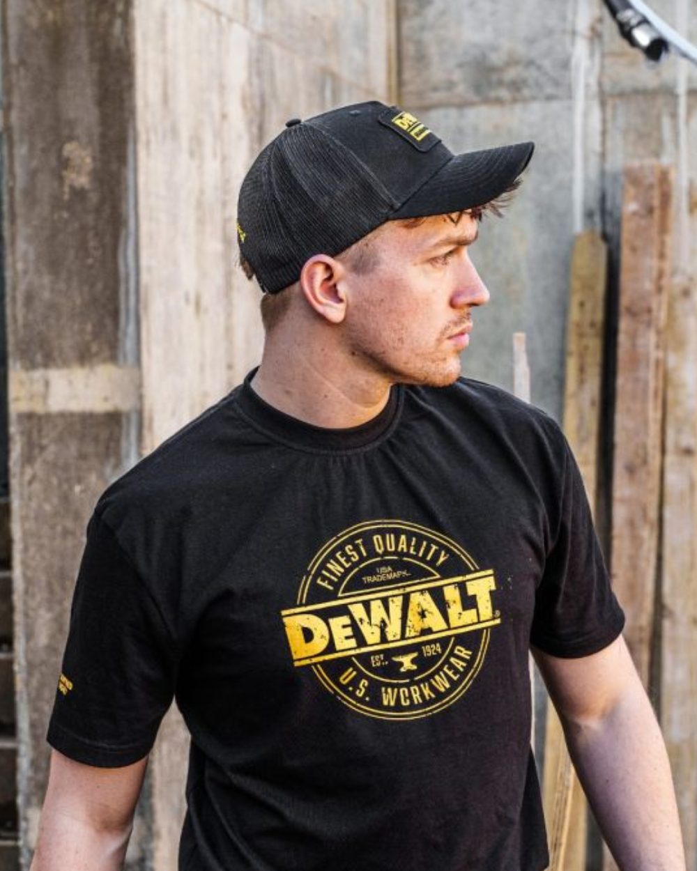 Black Coloured DeWalt Oakdale Baseball Cap On A Street Background