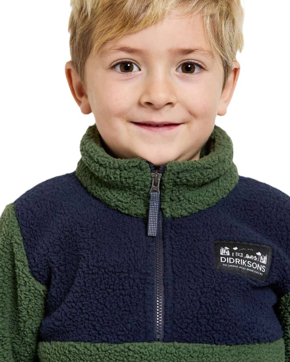 Pine Green Coloured Didriksons Childrens Gosig Half Zip Sweater On A White Background 