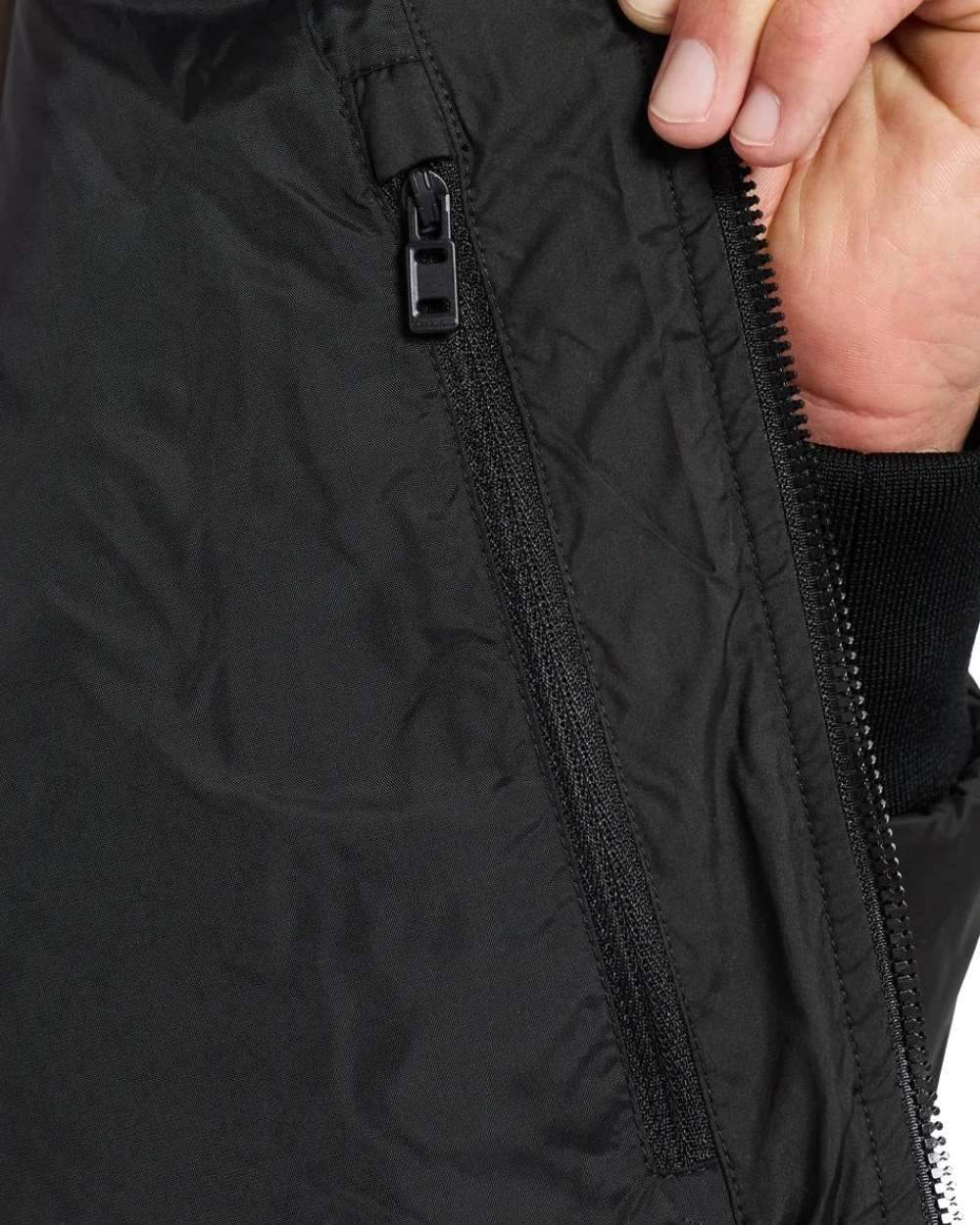 Black Coloured Didriksons Peder Jacket On A White Background 