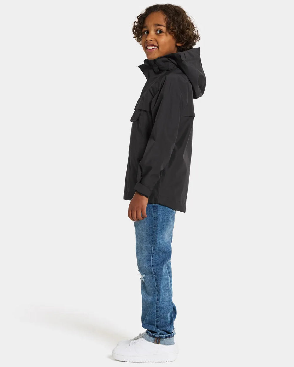 Black Coloured Didriksons Pi Childrens Anorak On A Grey Background 