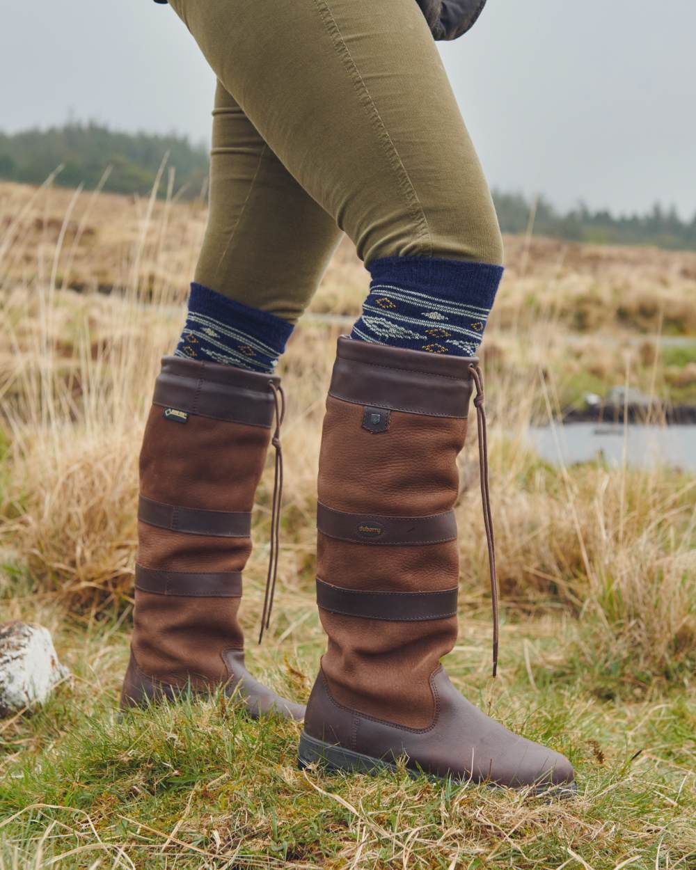 Navy Coloured Dubarry Alpaca Socks On A field Background 