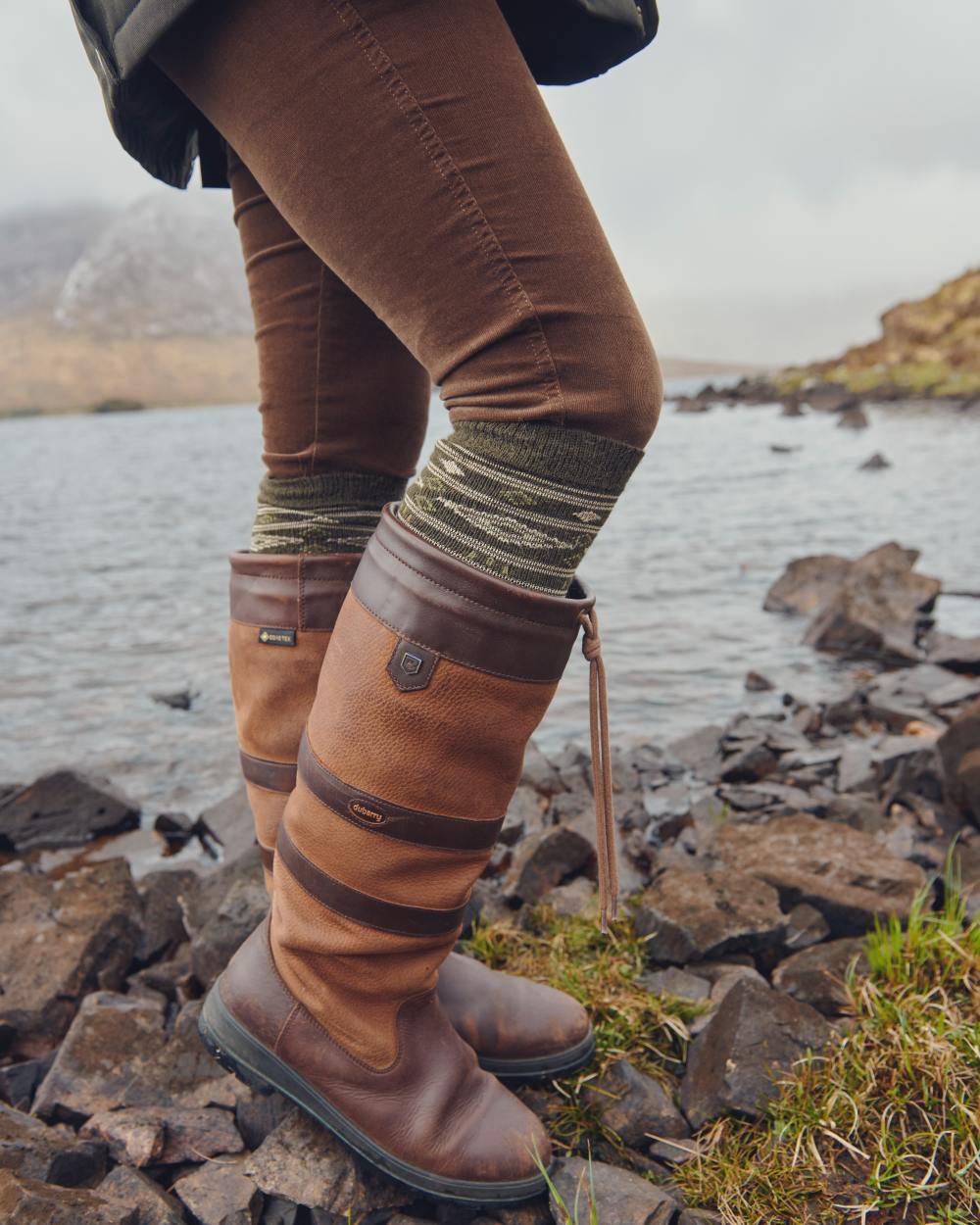 Olive Coloured Dubarry Alpaca Socks On A river Background 