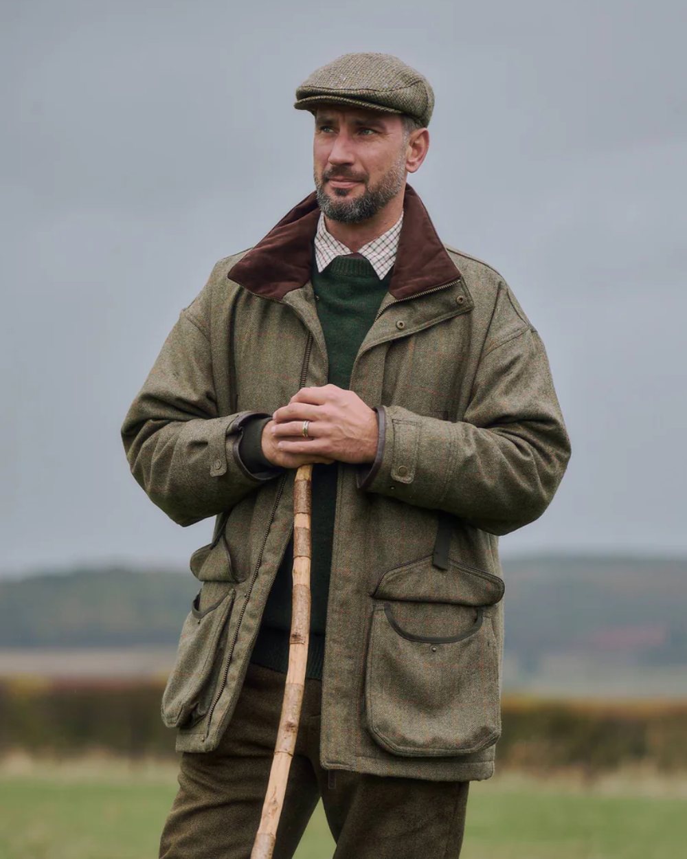 Cedar Coloured Dubarry Mens Ballinturbet Tweed Shooting Jacket On A blurry Background