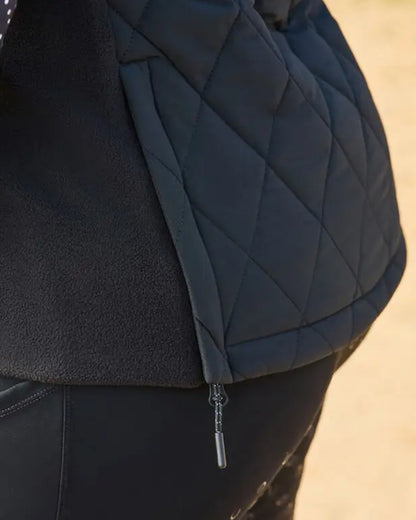 Black Coloured Dublin Curve Quinn Quilted Bodywarmer On A Street Background