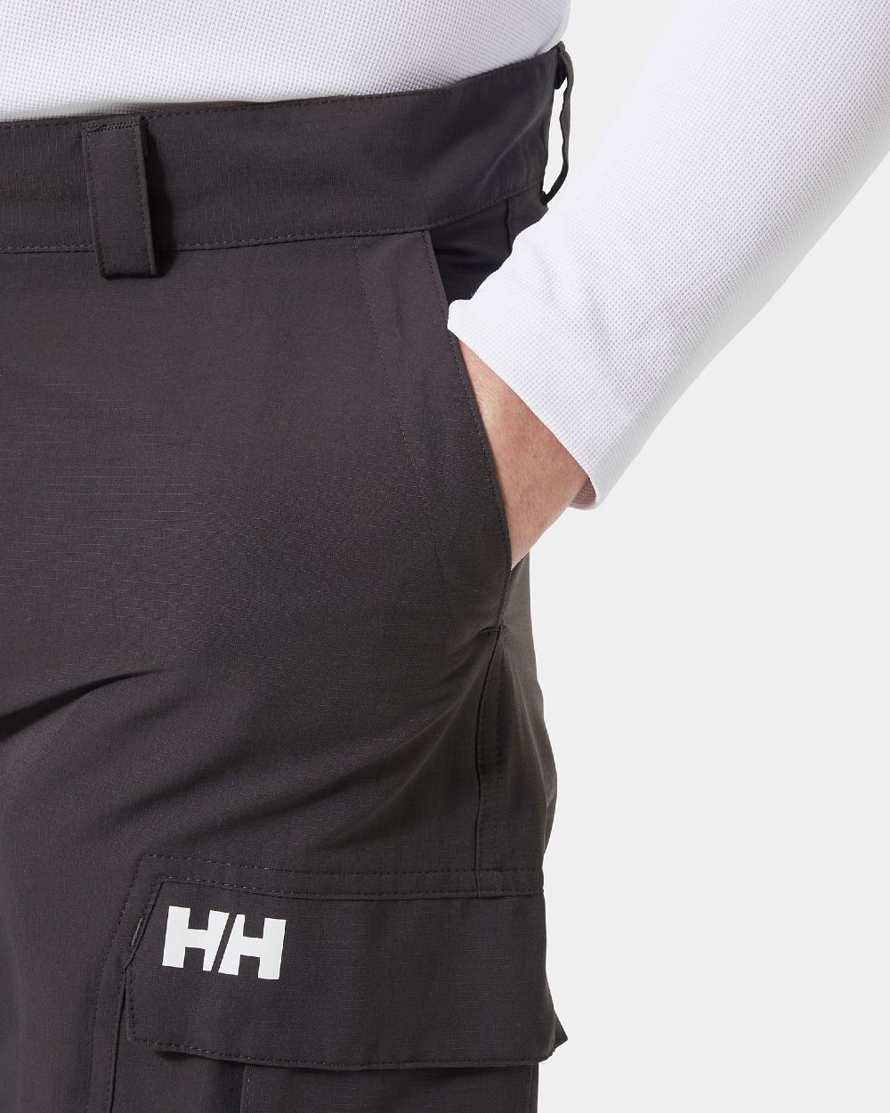 Ebony coloured Helly Hansen Mens HH quick dry cargo pant on grey background 