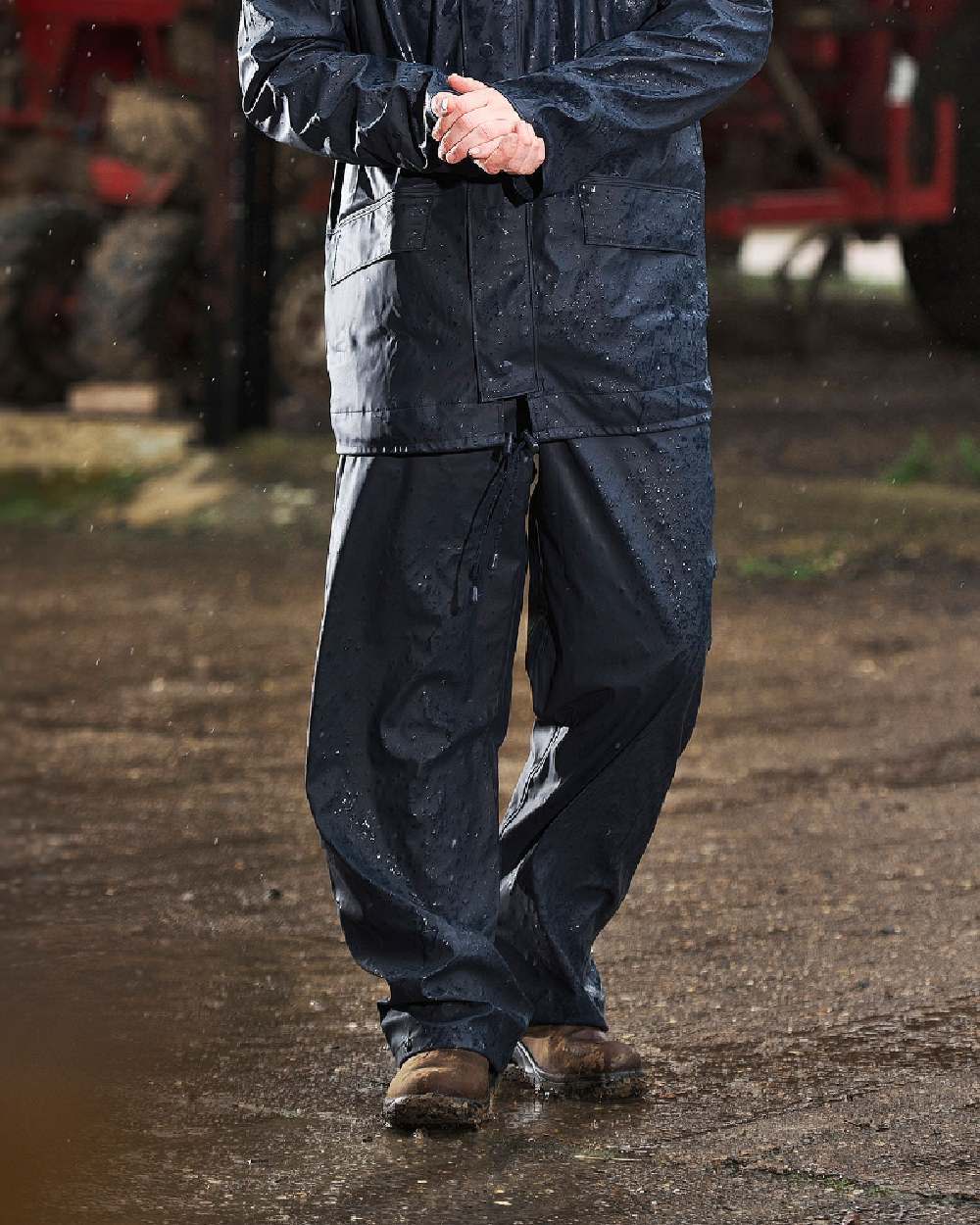 Navy Coloured Fort Airflex Waterproof Breathable Trousers On A Street Background 