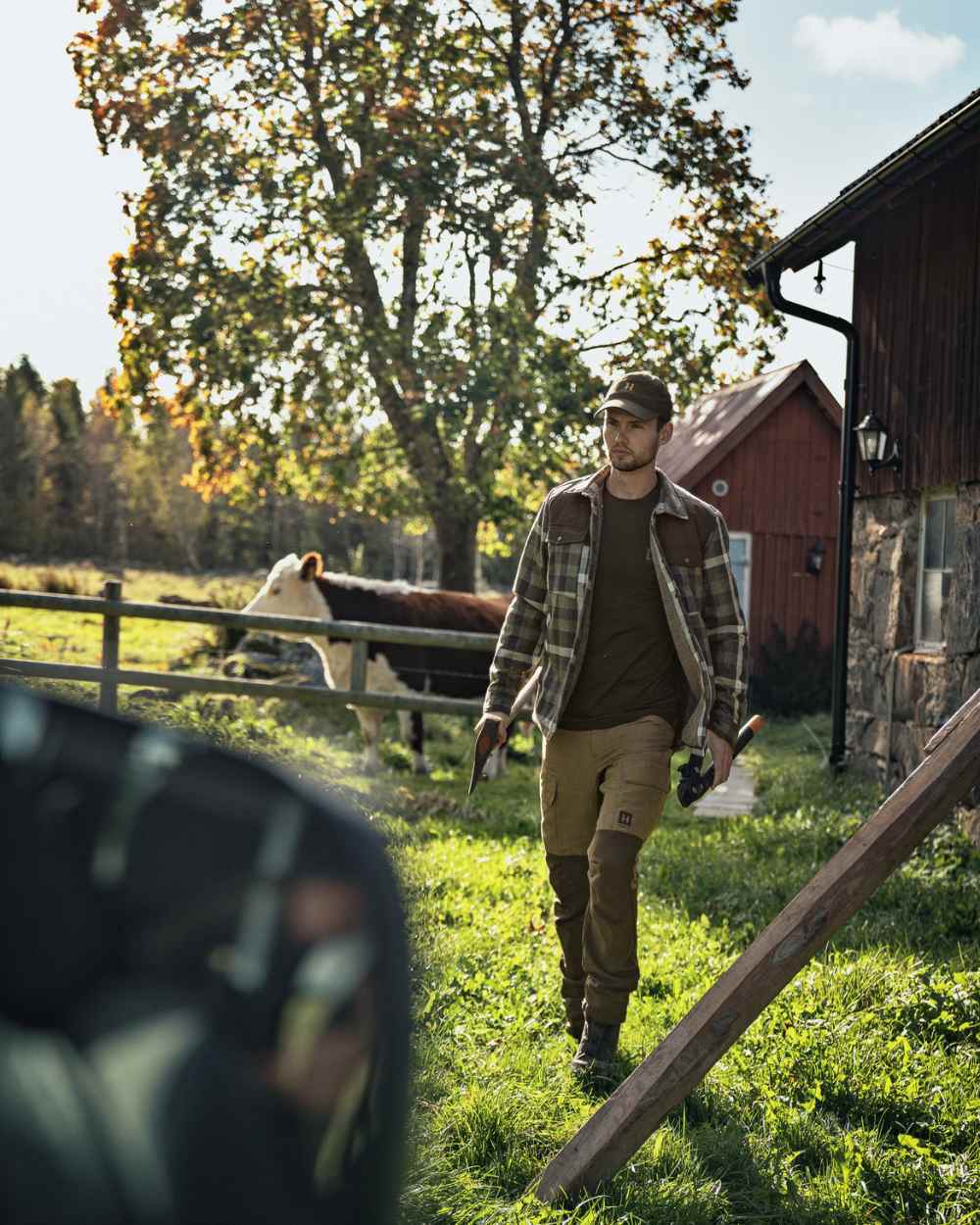 Willow Green Phantom Coloured Harkila Asmund Insulated Wool Shirt Jacket On A Backyard Background 