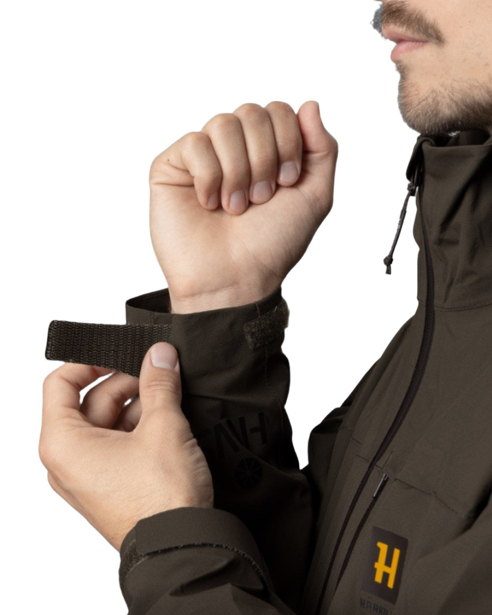 Willow Green Coloured Harkila Logmar HWS Packable Jacket on white background 