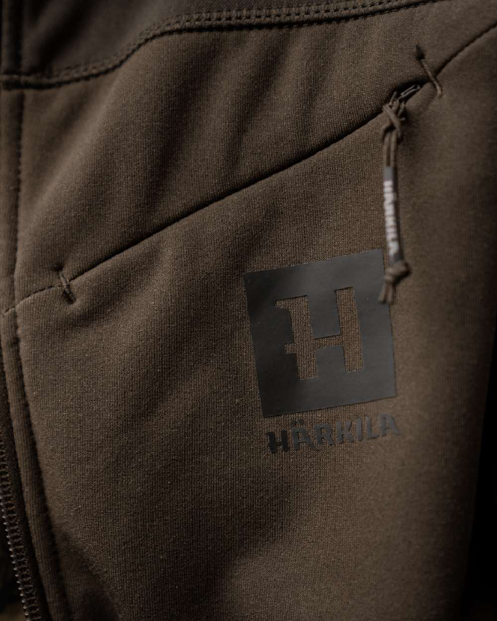 Willow Green Shadow Grey Coloured Harkila Olaf Fleece Jacket on outdoor background 