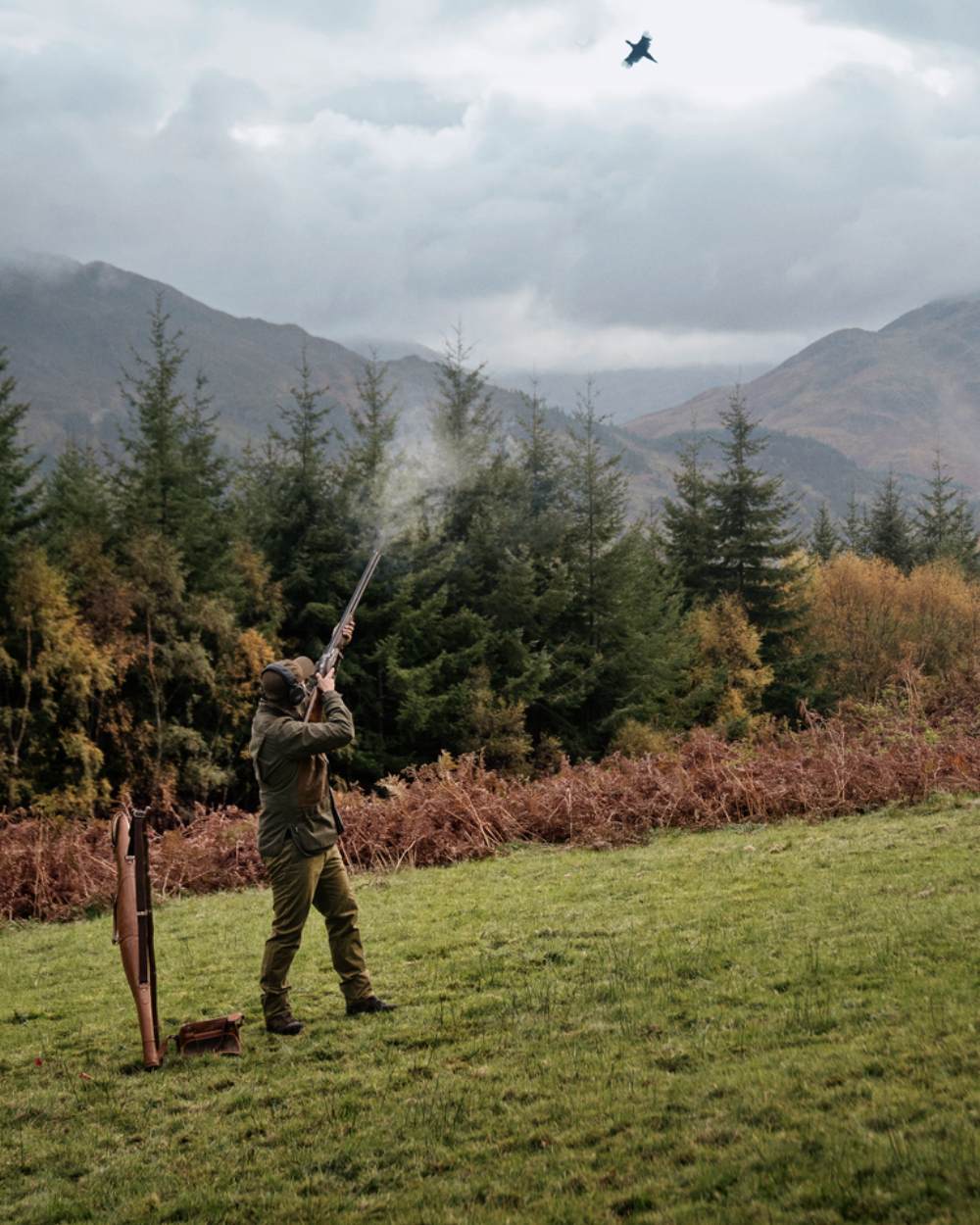 Willow Green Coloured Harkila Rannoch HWS Shooting Jacket On A Forest Background