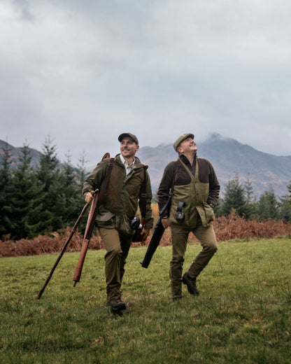 Willow Green Coloured Harkila Rannoch HWS Shooting Jacket On A Forest Background