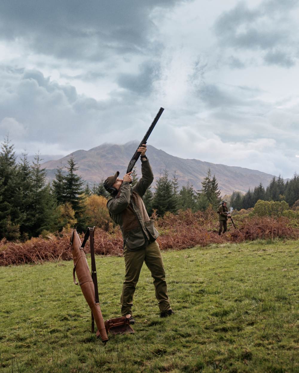 Willow Green Coloured Harkila Rannoch HWS Shooting Jacket On A Forest Background