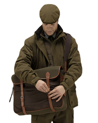 Warm Olive Coloured Harkila Retrieve Game Bag On A White Background