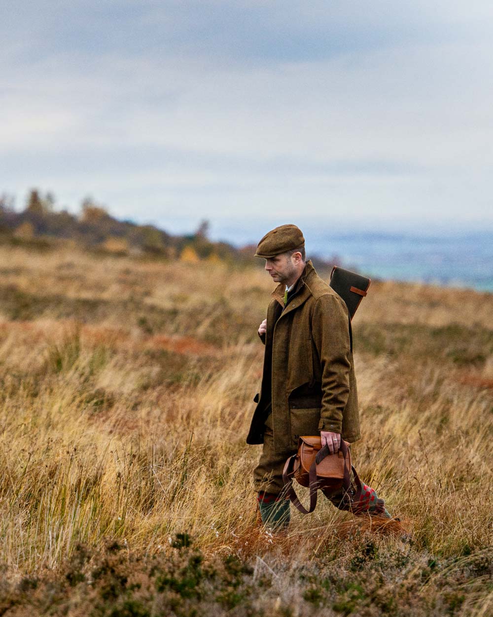 Harkila Stornoway 2.0 Tweed Shooting Jacket on Scenic background