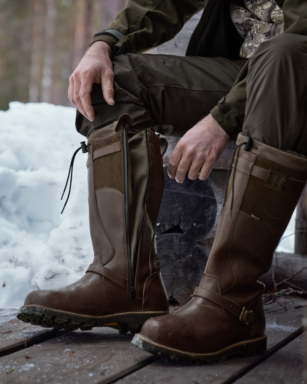 Willow Green Shadow Brown Coloured Harkila Visent 2.0 GTX Boots on snow background 