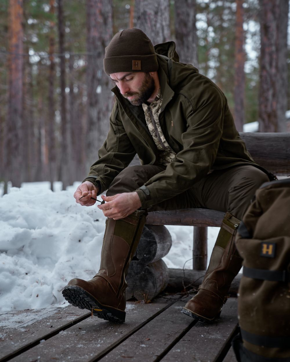 Willow Green Shadow Brown Coloured Harkila Visent 2.0 GTX Boots on snow background 