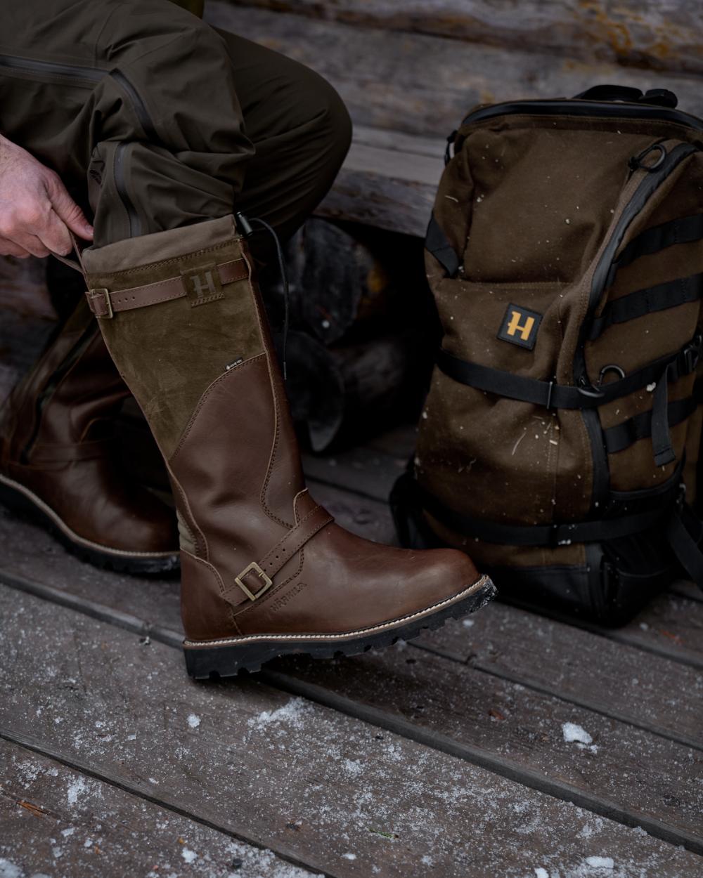 Willow Green Shadow Brown Coloured Harkila Visent 2.0 GTX Boots on snow background 