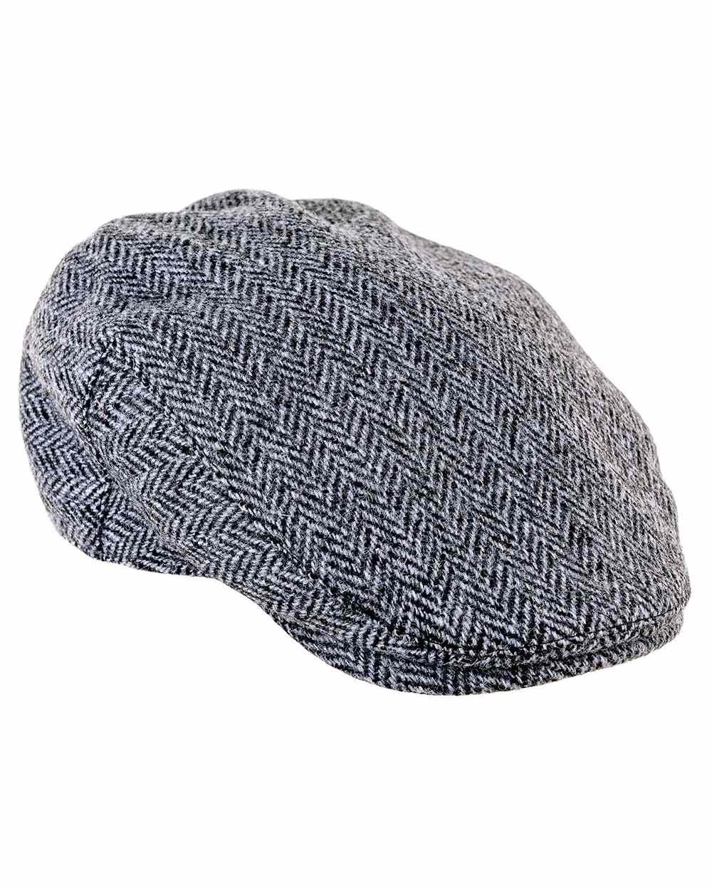 Black Grey Coloured Heather Highland Harris Tweed Flat Cap On A White Background 