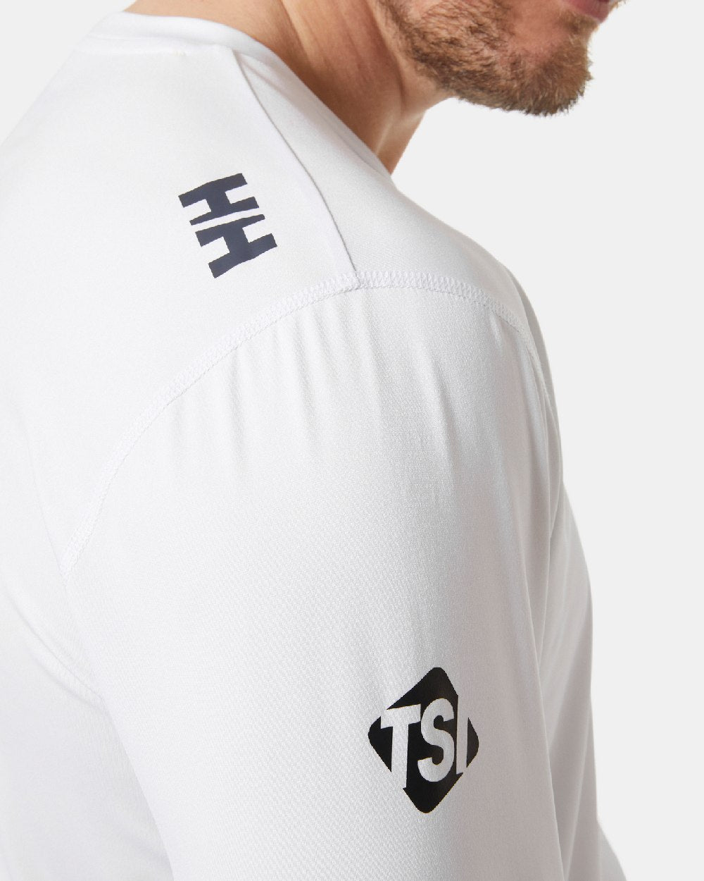 White coloured Helly Hansen American Magic UPF Tech Long Sleeves Shirt on grey background 