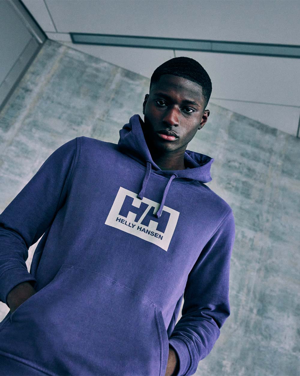 Dusty Purple coloured Helly Hansen Box Hoodie on Urban background 