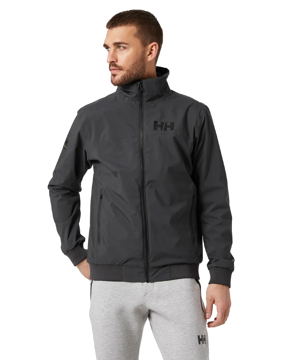 Ebony coloured Helly Hansen Mens HP Racing Lifaloft Bomber Jacket on white background 