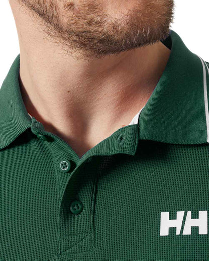 Jungle Green Coloured Helly Hansen Kos Polo Shirt on White Background

