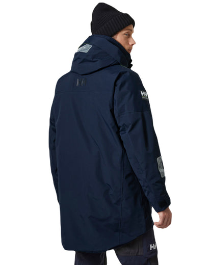 Navy Coloured Helly Hansen Mens Arctic Ocean H2FLOW Parka On A White Background 