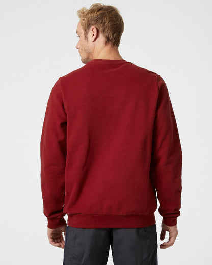 Oxblood coloured Helly Hansen Mens Arctic Ocean Sweatshirts on grey background 