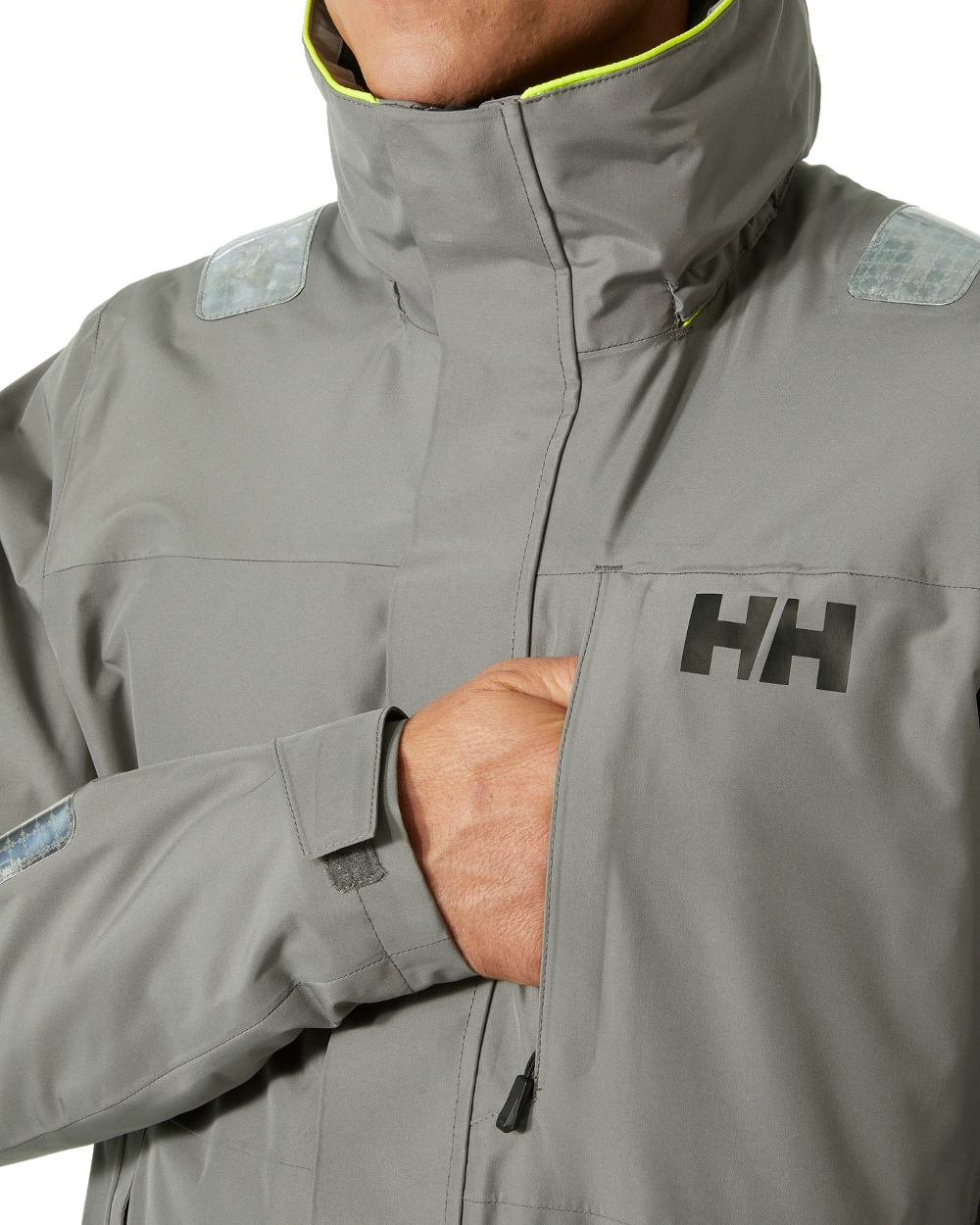 Concrete coloured Helly Hansen Mens Arctic Shore Jacket on white background 