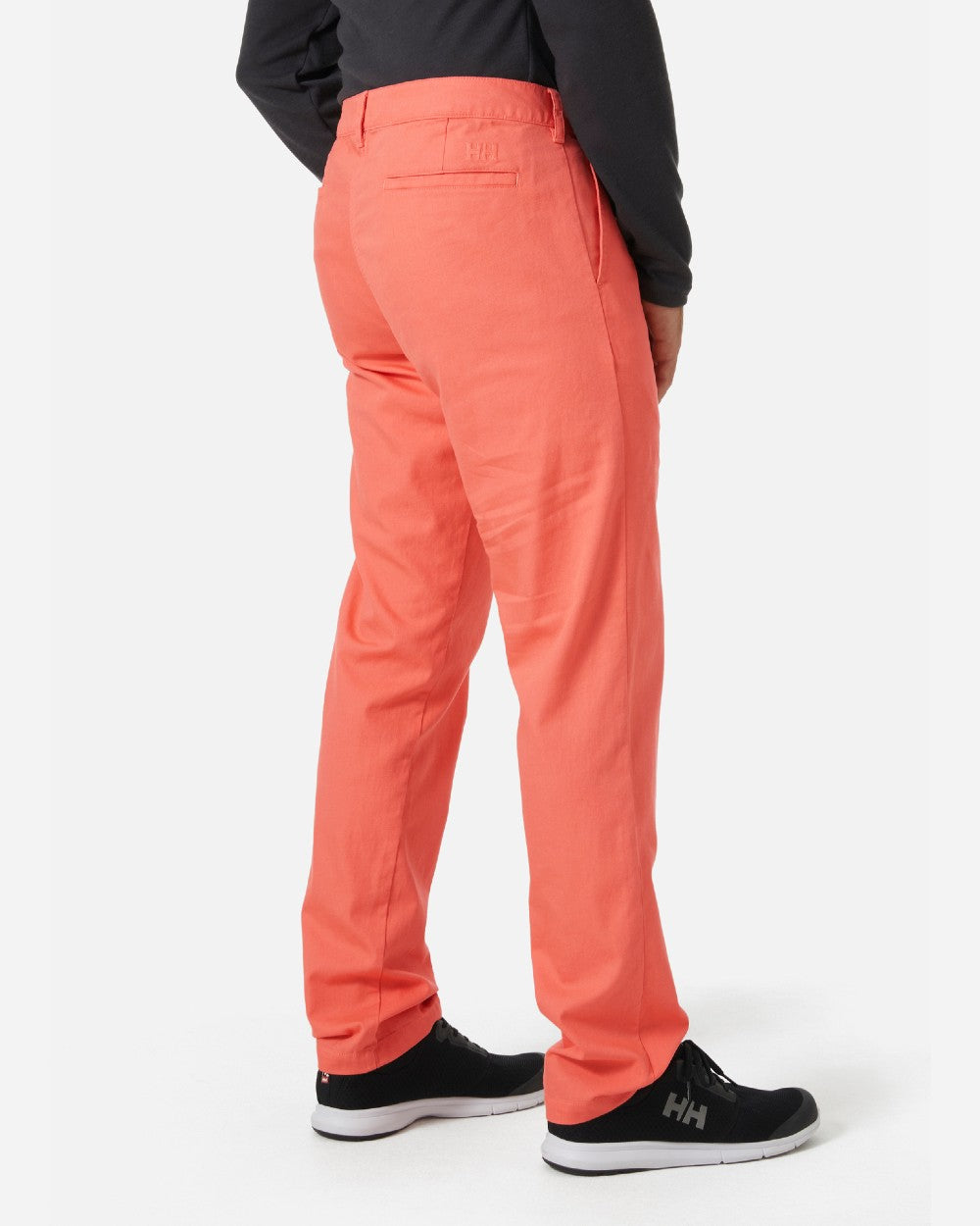 Peach Echo coloured Helly Hansen Mens Dock Chinos on grey background 