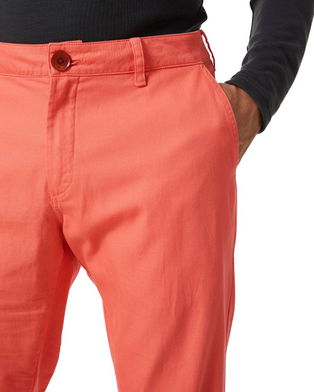 Peach Echo coloured Helly Hansen Mens Dock Chinos on white background 