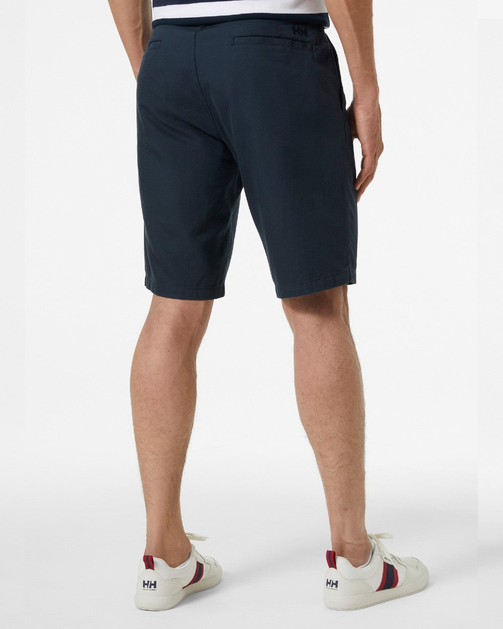 Navy coloured Helly Hansen Mens Dock Shorts on grey background 