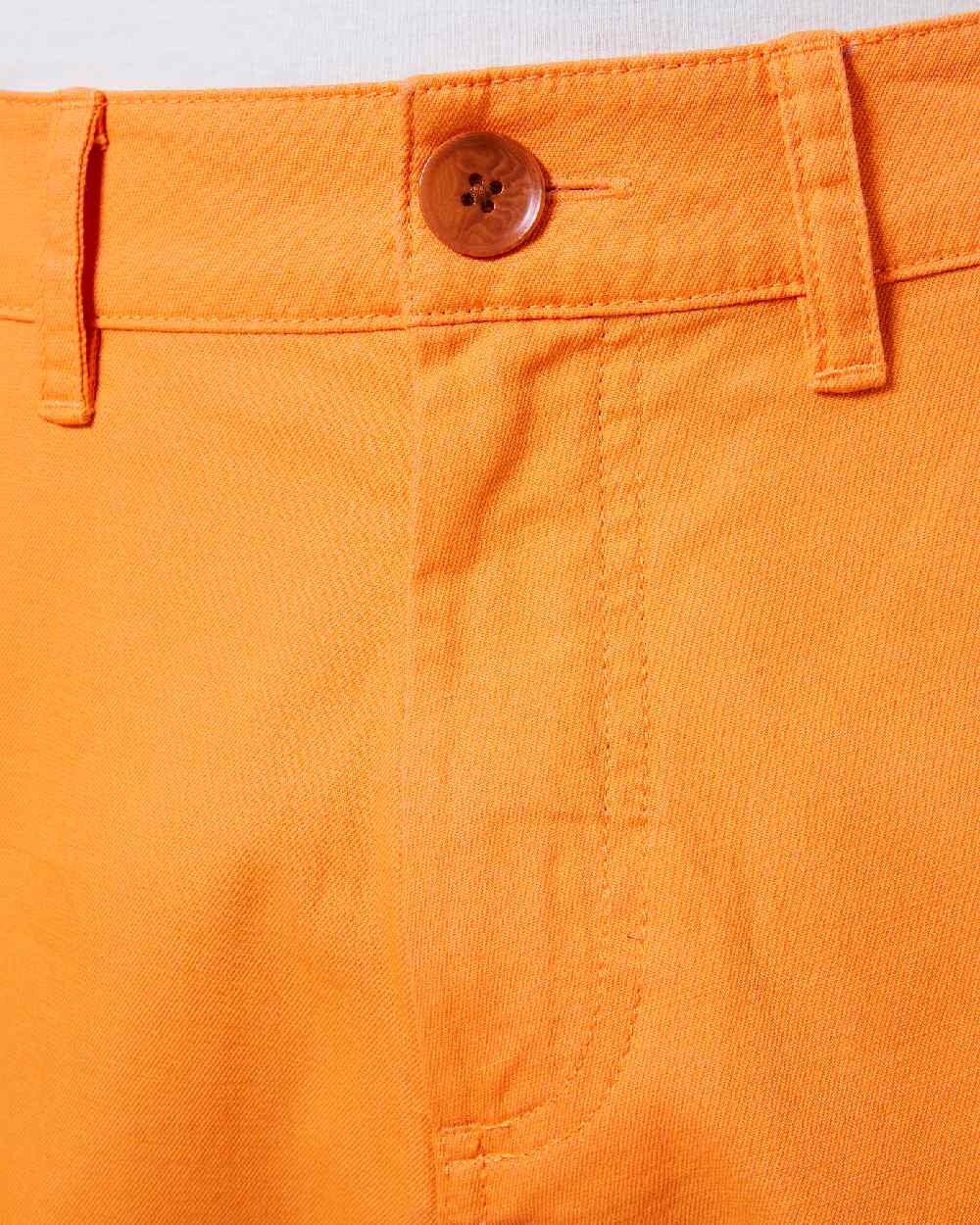 Poppy Orange coloured Helly Hansen Mens Dock Shorts on white background 