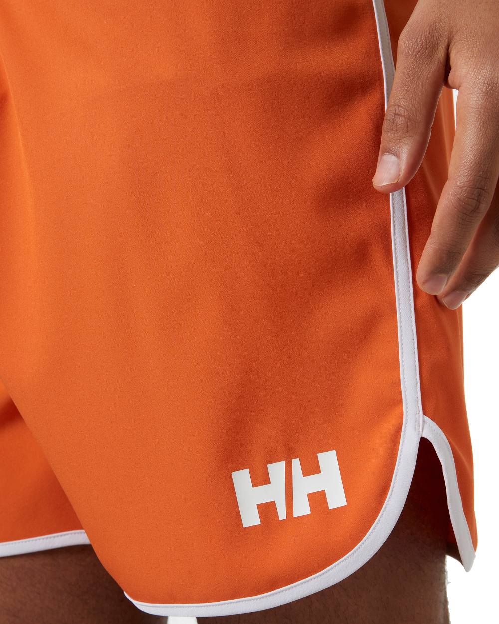 Flame coloured Helly Hansen Mens HP 7 inch Curve Board Shorts on white background 