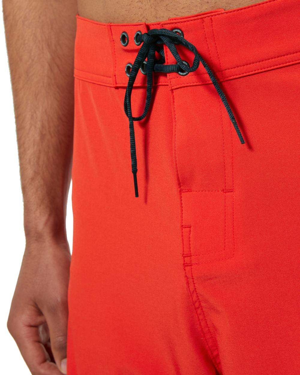 Alert Red Coloured Helly Hansen Mens HP 9 inch Board Shorts 3.0 on white background 