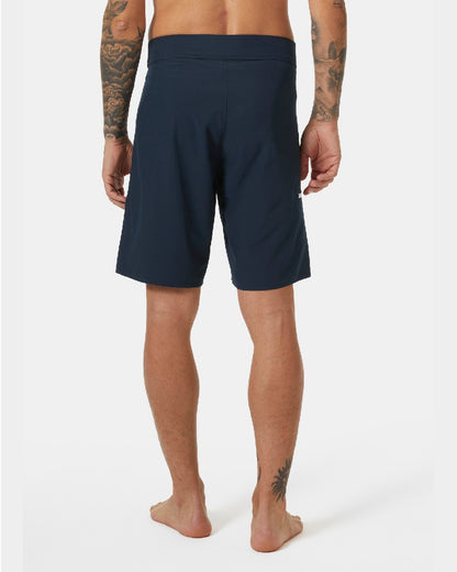 Navy Coloured Helly Hansen Mens HP 9 inch Board Shorts 3.0 on grey background 