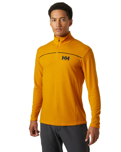 Cloudberry coloured Helly Hansen Mens HP Half Zip Pullover Shirt on white background 