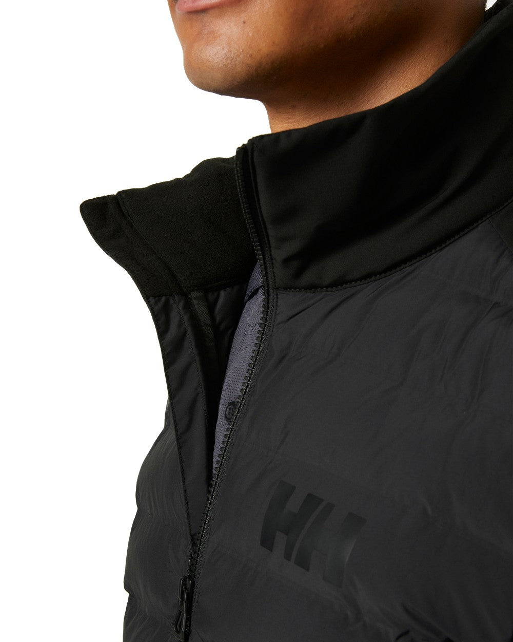 Black coloured Helly Hansen Mens Hp Insulator 2.0 on white background 