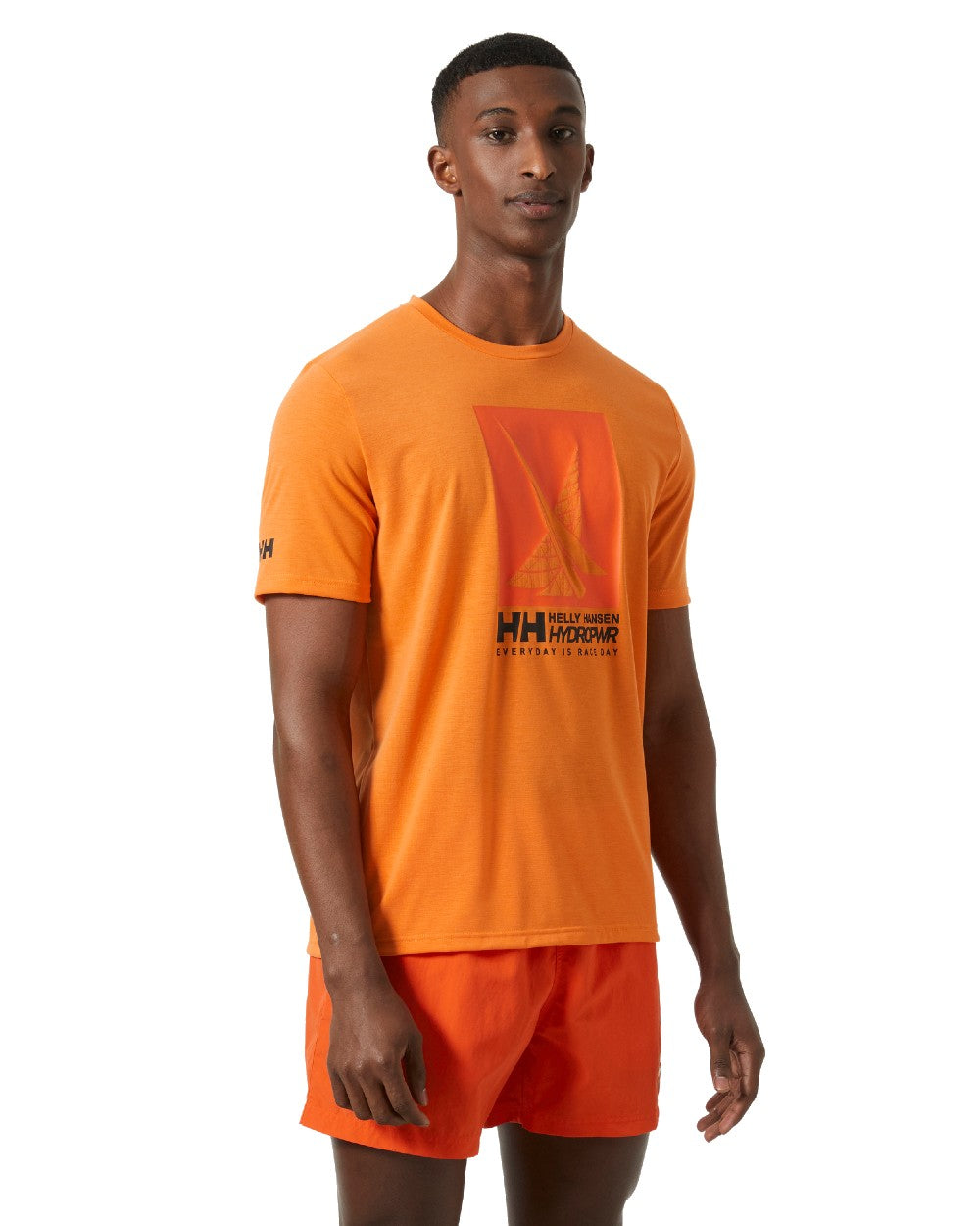 Poppy Orange coloured Helly Hansen Mens HP Race Sailing Graphic T-shirt on white background 