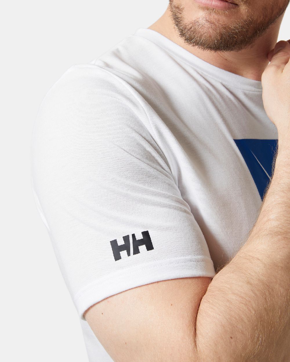 White coloured Helly Hansen Mens HP Race Sailing Graphic T-shirt on grey background 