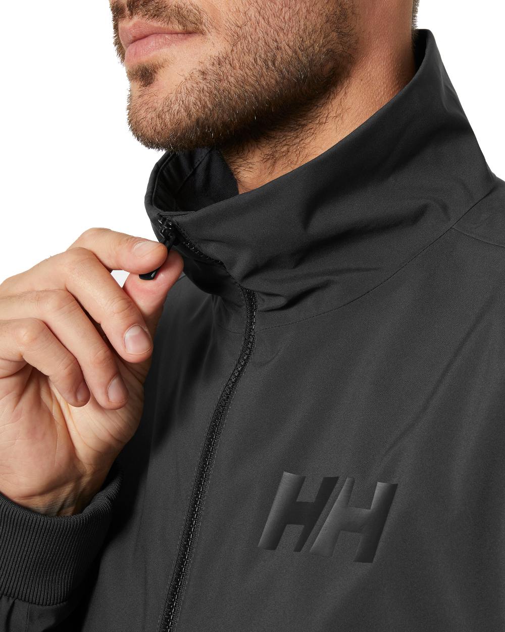 Ebony coloured Helly Hansen Mens HP Racing Bomber Sailing Jacket 2.0 on white background 