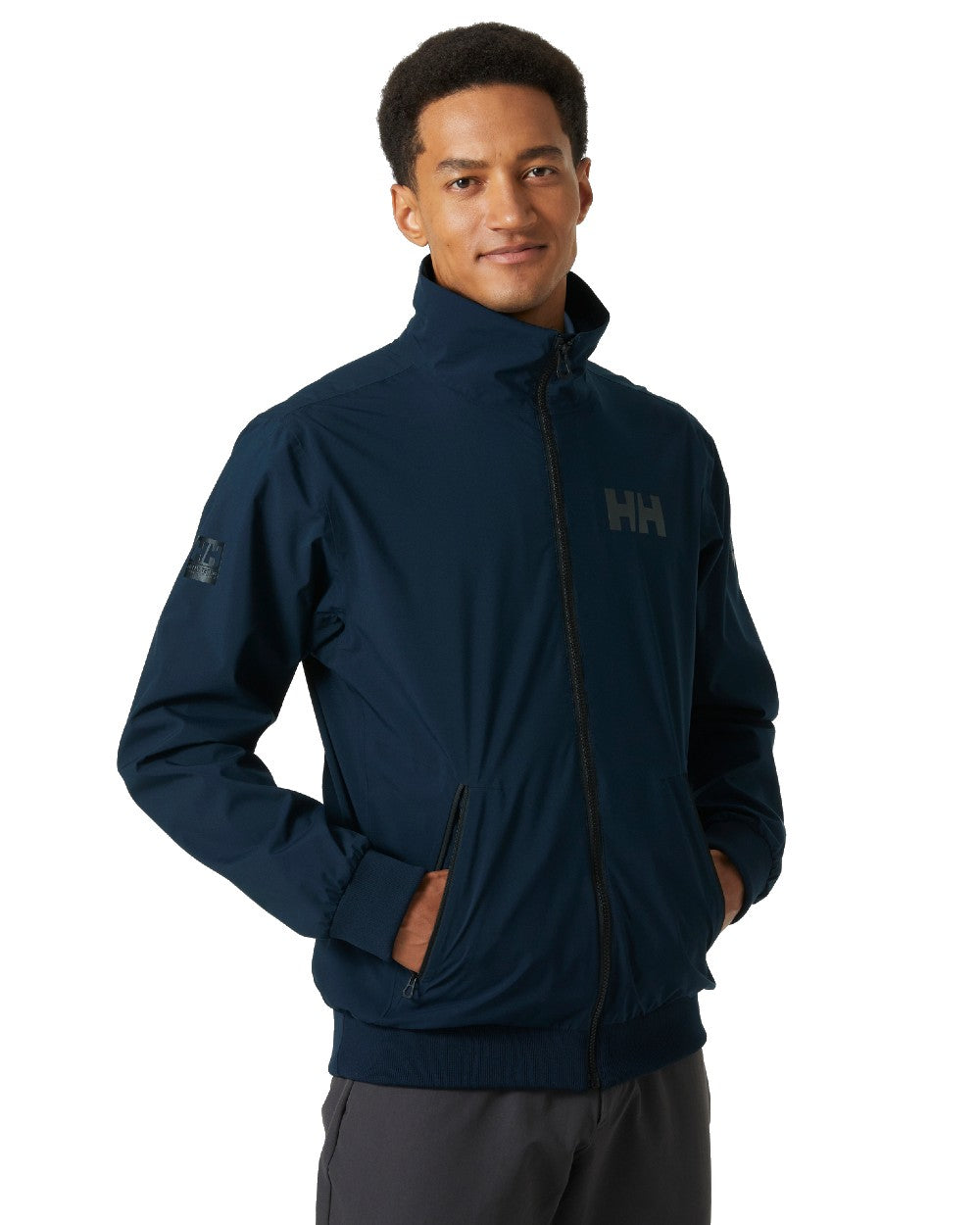 Navy coloured Helly Hansen Mens HP Racing Bomber Sailing Jacket 2.0 on white background 