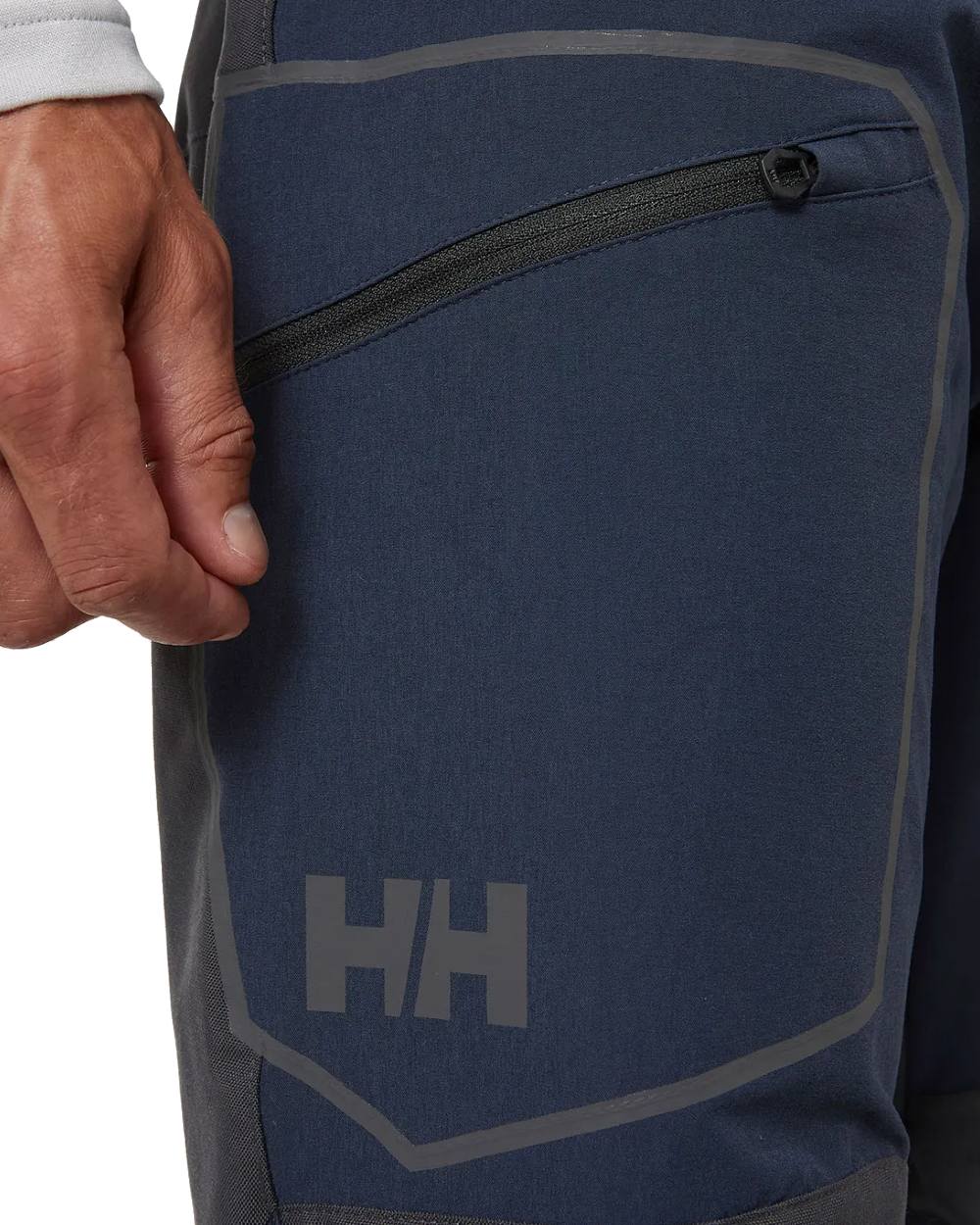 Navy coloured Helly Hansen Mens HP Racing Deck Pants on white background 