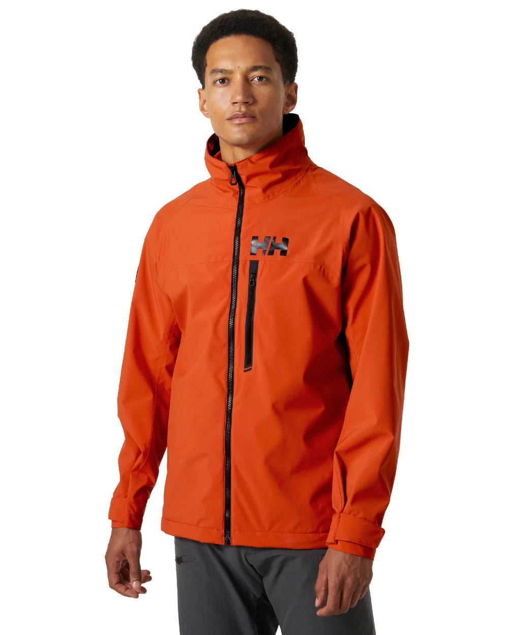 Patrol Orange coloured Helly Hansen Mens HP Racing Sailing Jacket on white background 