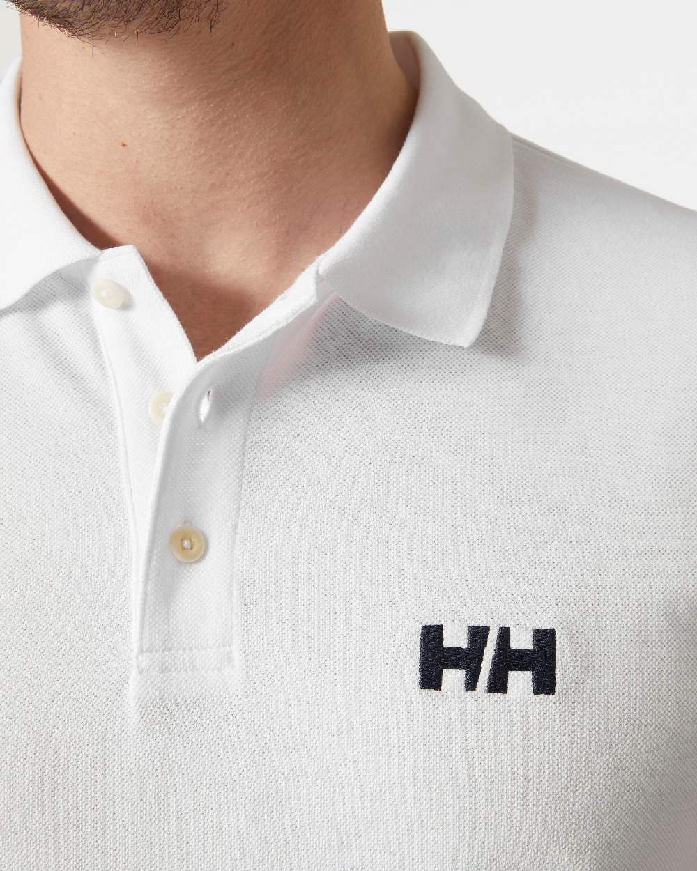 White coloured Helly Hansen Mens Malcesine Polo T-Shirt on grey background 
